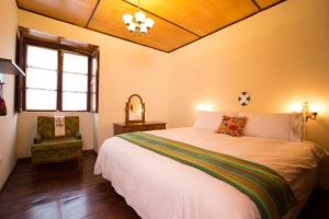 Postel nebo postele na pokoji v ubytování Casa LunaLoma - Boutique Apartments