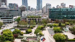 a view of a park in a city with buildings at Wedgewood Hotel & Spa - Relais & Chateaux in Vancouver