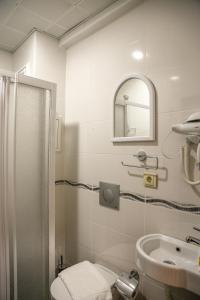 Ein Badezimmer in der Unterkunft Reggae Apart Hotel
