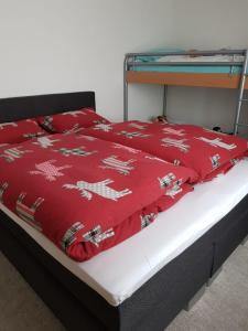 מיטה או מיטות בחדר ב-Primel (385 Sw) Whg. Manuela