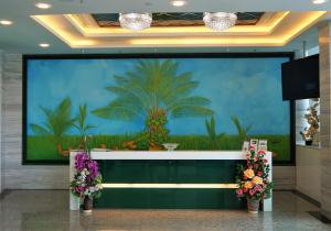 The lobby or reception area at Pine Garden Hotel