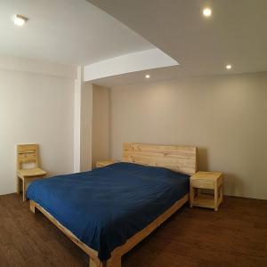 Postel nebo postele na pokoji v ubytování Sayami Home