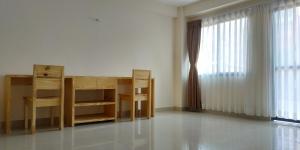 A bed or beds in a room at Sayami Home