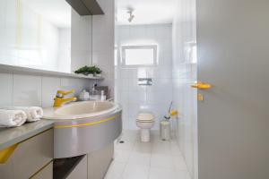 A bathroom at Panoramic view roof garden apartment