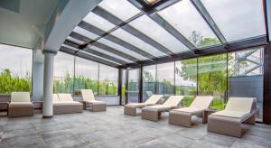 Posezení v ubytování SPA Boutique Appartement # 26 with Indoor- and Outdoorpool