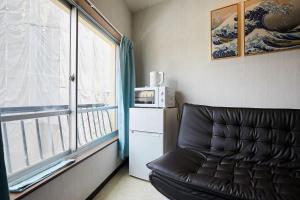 Η κουζίνα ή μικρή κουζίνα στο Mitsuba Guest House