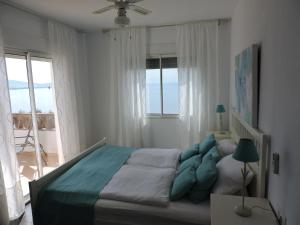 En eller flere senge i et værelse på Villa Romantika + 21 billeder