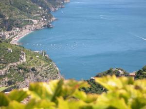 a view of a body of water with boats in it at Hotel Parsifal - Antico Convento del 1288 in Ravello