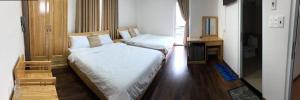 Postel nebo postele na pokoji v ubytování Spring Hotel