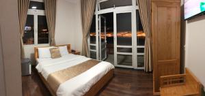 Postel nebo postele na pokoji v ubytování Spring Hotel