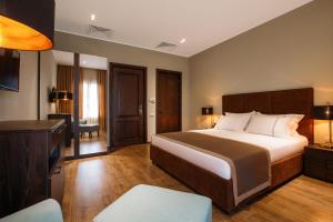 Postel nebo postele na pokoji v ubytování LETO Boutique Hotel Zugdidi