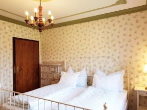 Łóżko lub łóżka w pokoju w obiekcie Aparthotel Pan Haus