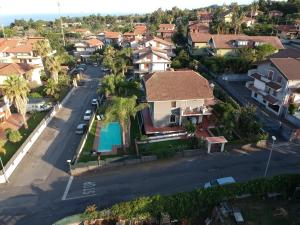 an aerial view of a residential neighborhood with a house at Antichi Ricordi in Aci SantʼAntonio