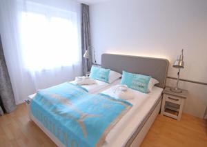 Postel nebo postele na pokoji v ubytování Backbord by WellenRausch
