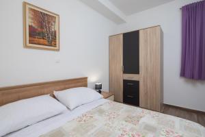 Postel nebo postele na pokoji v ubytování The Beach Suites