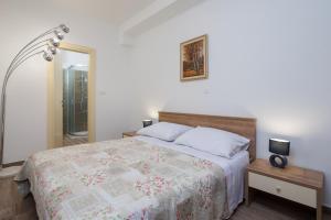Postel nebo postele na pokoji v ubytování The Beach Suites