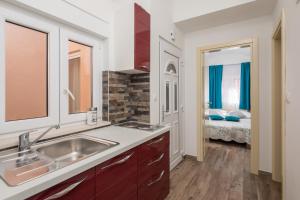 Postel nebo postele na pokoji v ubytování The Beach Suites
