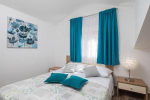 Postel nebo postele na pokoji v ubytování The Beach Suites