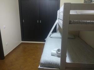 Łóżko lub łóżka w pokoju w obiekcie Casa Sevilla Nervión-Centro