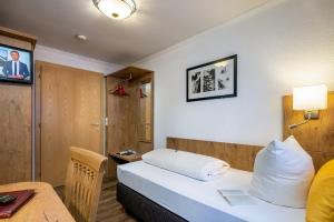 TV a/nebo společenská místnost v ubytování Hotel Das Schlossberg superior