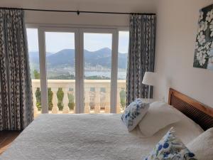 Ein Bett oder Betten in einem Zimmer der Unterkunft Holiday Villa Port d'Andratx