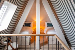 Cama ou camas em um quarto em Hôtel Longemalle