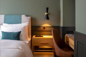 Cama ou camas em um quarto em Hôtel Longemalle