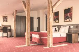 Łóżko lub łóżka w pokoju w obiekcie Hotel Centrum Sosnowiec