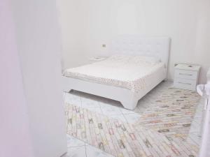 Postel nebo postele na pokoji v ubytování Guesthouse Anila