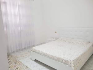 Postel nebo postele na pokoji v ubytování Guesthouse Anila