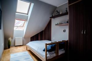 Posteľ alebo postele v izbe v ubytovaní Hollo Apartment - PRIVATE GARAGE - A/C