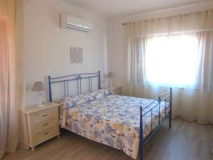 Postel nebo postele na pokoji v ubytování PUNTO ZERO ROOMS