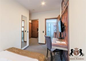 Posteľ alebo postele v izbe v ubytovaní Celestin Residence