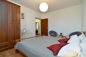 Posteľ alebo postele v izbe v ubytovaní Apartment Pineta 1817