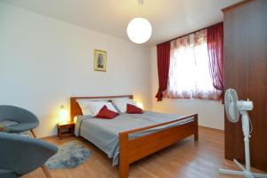 Posteľ alebo postele v izbe v ubytovaní Apartment Pineta 1817
