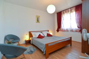 Posteľ alebo postele v izbe v ubytovaní Apartment Pineta 1817