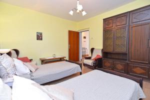 Posteľ alebo postele v izbe v ubytovaní Apartment Pineta 1817