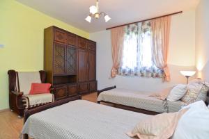 Posteľ alebo postele v izbe v ubytovaní Apartment Pineta 1817