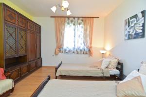 Posteľ alebo postele v izbe v ubytovaní Apartment Pineta 1817