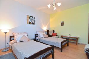 Posteľ alebo postele v izbe v ubytovaní Apartment Pineta 1817