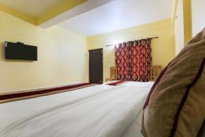 Tempat tidur dalam kamar di Vision Safari Pvt Ltd