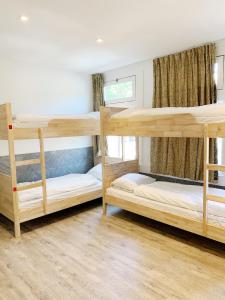 Двухъярусная кровать или двухъярусные кровати в номере Hostel The Globe