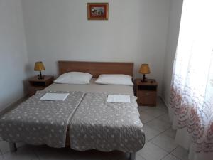 Postel nebo postele na pokoji v ubytování Apartment in Vinišce with Seaview, Balcony, Air condition, WIFI (4752-2)