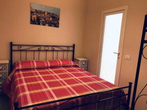 Ένα ή περισσότερα κρεβάτια σε δωμάτιο στο Nilla Apartments