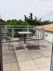 A balcony or terrace at Domitys Le Clos de la Seigneurie