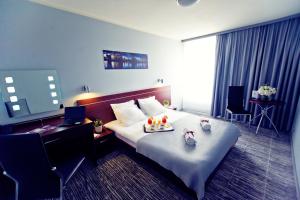 Posteľ alebo postele v izbe v ubytovaní Hotel Śląsk
