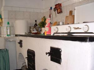 a kitchen with a stove and a counter top at Medieval Village Rural B&B in Ne +143 photos