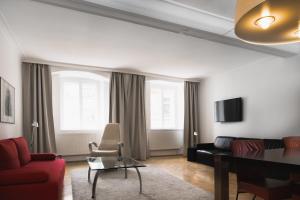 Telewizja i/lub zestaw kina domowego w obiekcie Apartments Golden Roof by Penz