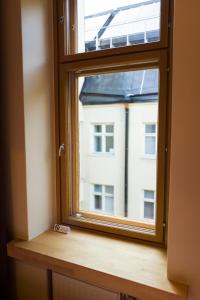 a window with a view of a building at Hotel Finn in Helsinki