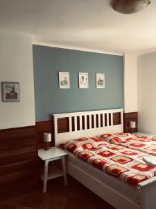 Postel nebo postele na pokoji v ubytování Penzion U Horských